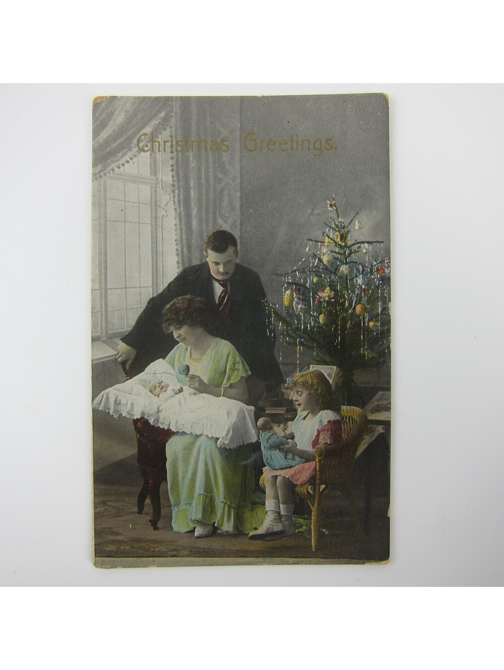 Antique Christmas Postcard Family Portrait Man Woman Girl Baby Tree Trimmed 1915